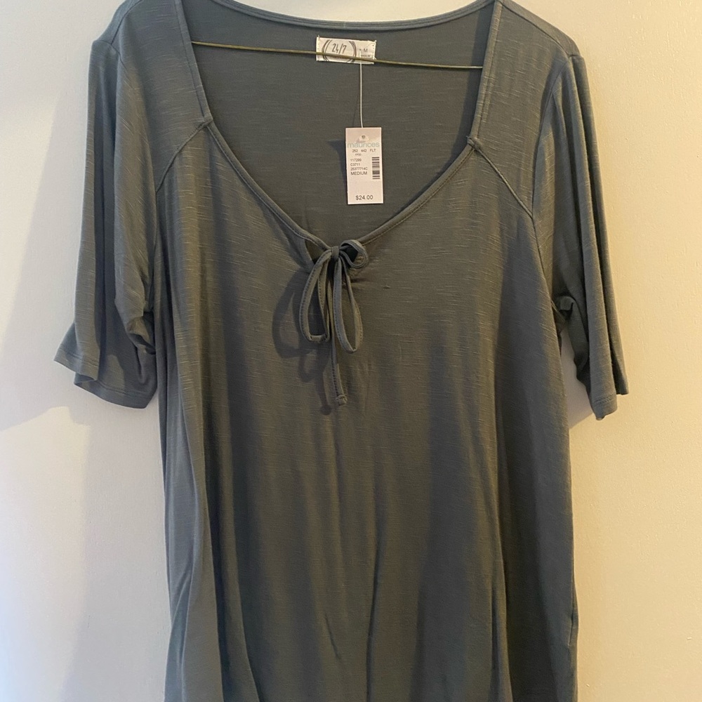 Olive green woman’s shirt.